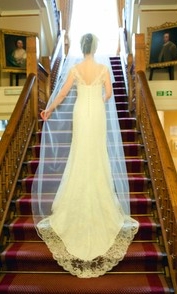  Jessica in ivory lace dress stairs